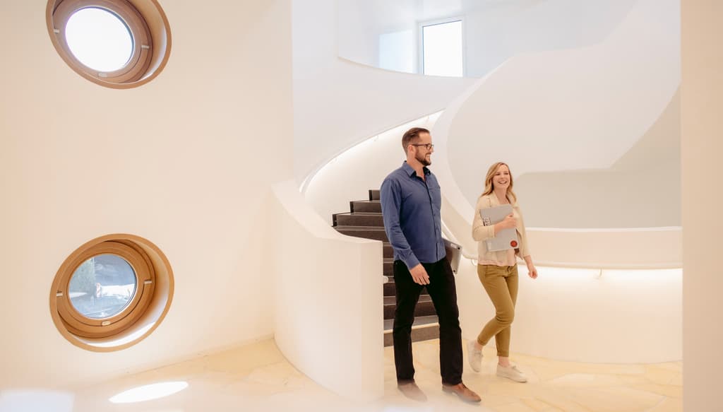 In unserem modernen Neubau, dem dm-dialogicum in Karlsruhe-Durlach.
